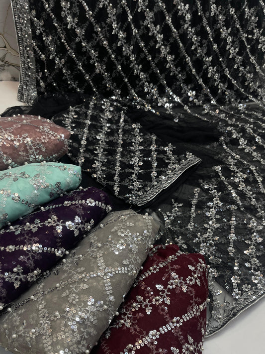 Soft Net sequence work With Machine Embroided saree